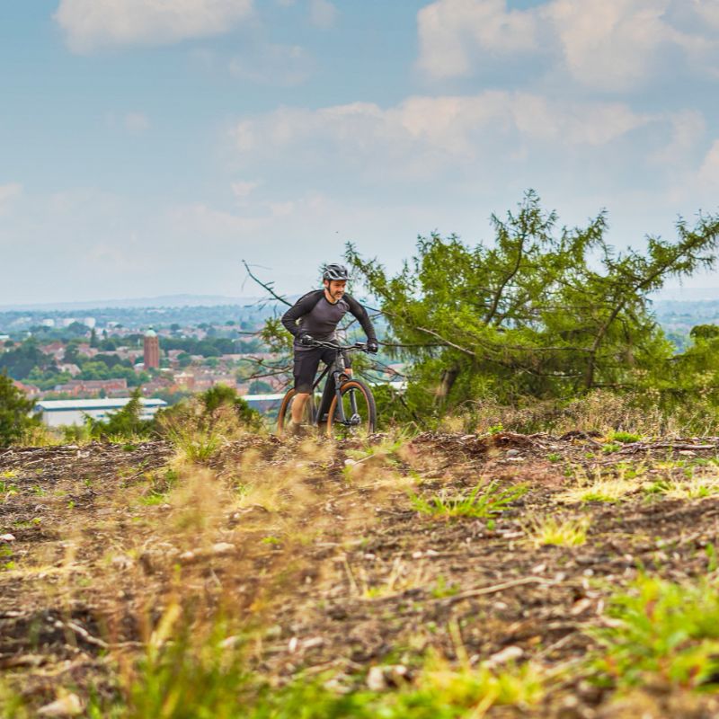 ClaudButlerWrath2.0 lifestyle Person riding on a trail with a scenic background