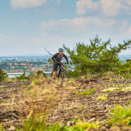 ClaudButlerWrath2.0 lifestyle Person riding on a trail with a scenic background