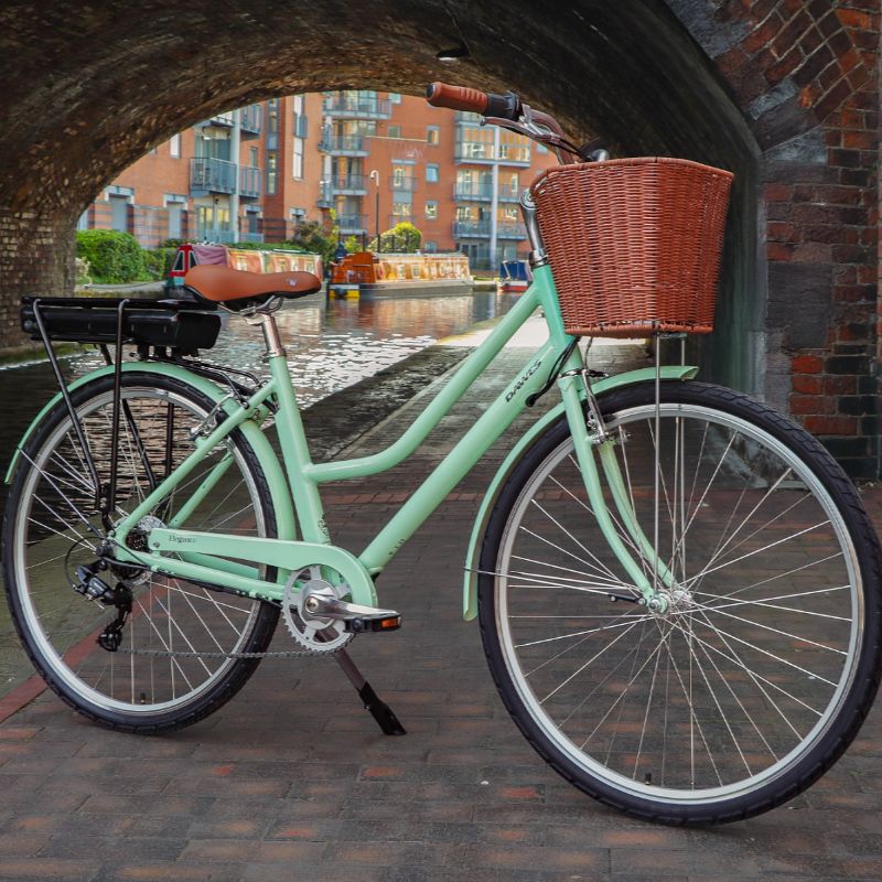 Dawes Elegance lifestyle with a brown basket parked under a brick arch.
