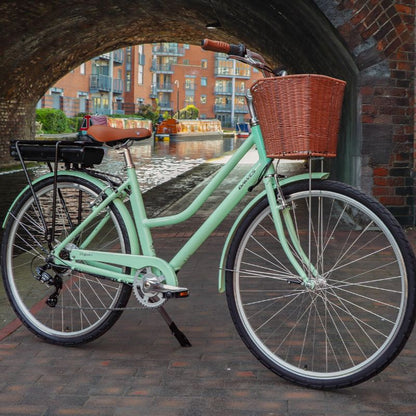 Dawes Elegance lifestyle with a brown basket parked under a brick arch.
