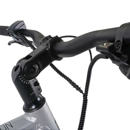 Falcon Horizon Cross Bar Hybrid e-bike adjustable handlebars Close-up with black grips and brake levers on a white background