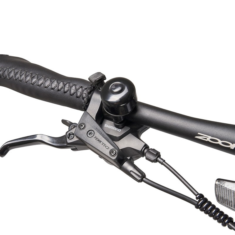 Hygge Losso Close-up handlebar with Shimano and Tektro components on a white background