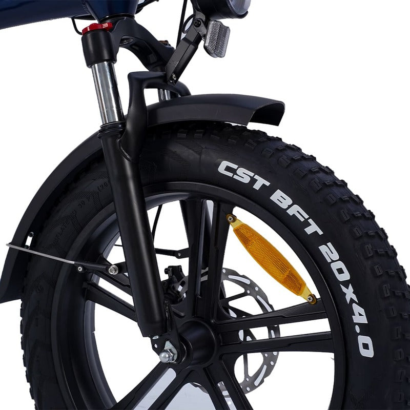 Hygge Soro Close-up bicycle wheel with CST tire branding on a white background