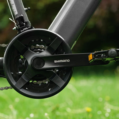 Roxform Gravion crossroad eMTB chain guard Close-up with a blurred green background