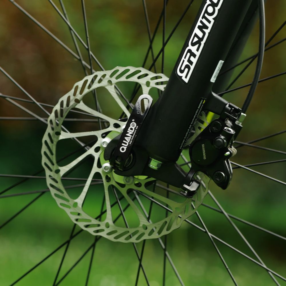 Roxform Gravion crossroad eMTB front disk brakes Close-up with a blurred green background