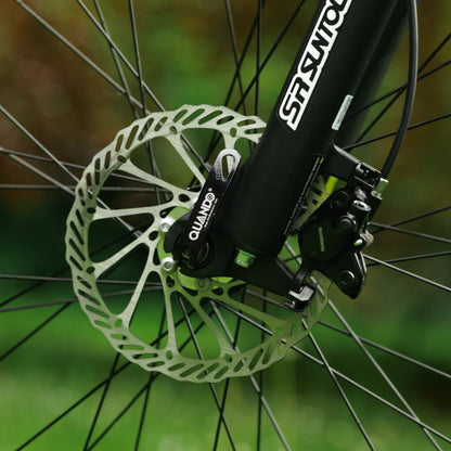 Roxform Gravion crossroad eMTB front disk brakes Close-up with a blurred green background