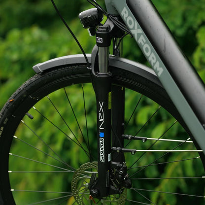 Roxform Stride L e-bike suspension fork against a blurred green background