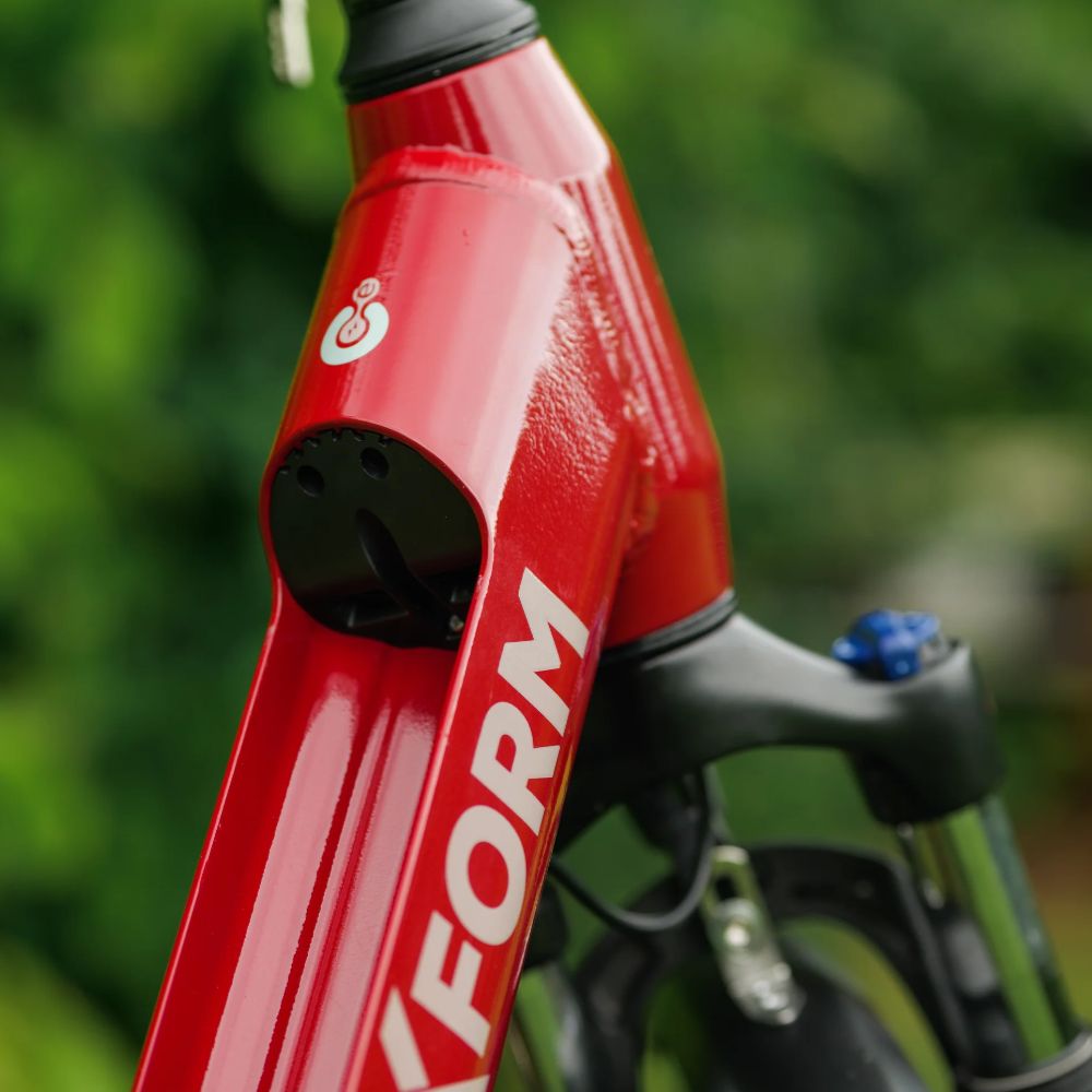 Roxform_Stride_S_e-bike_battery_slot Close-up  against a blurred green background