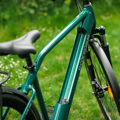 Roxform Valor S e-bike battery slot on a grassy background
