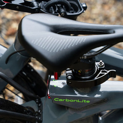 e-go CarbonLite3S saddle folded on a blurred background