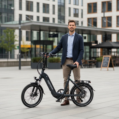 Roxform-Plico-folding-electric-bike-lifestyle-image Man standing in an urban setting